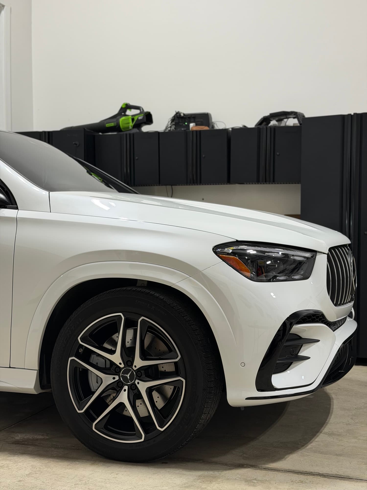 White Mercedes-AMG GLE Coupe side profile at the Diamond Detailz shop