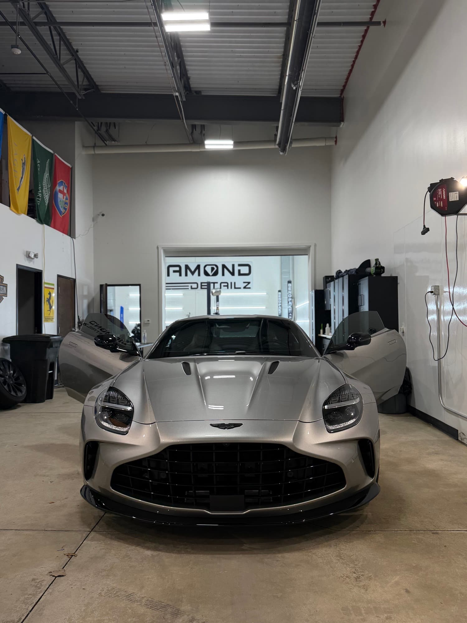Aston Martin Vantage with light ceramic tint on side windows at the Diamond Detailz shop